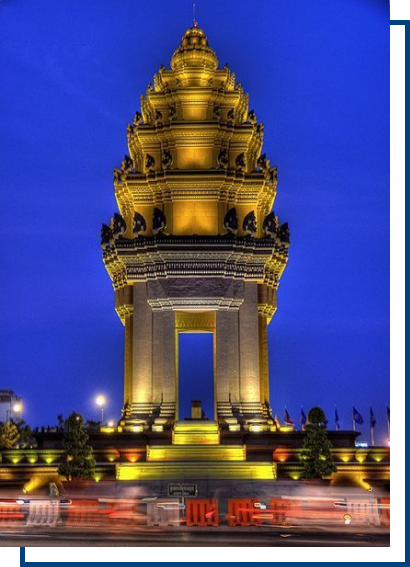 a large building with a large arch with Independence Monument in the background